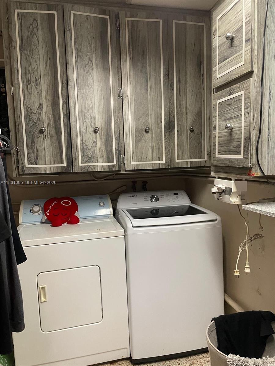266 East 12th Street Hialeah, FL 33010 - Photo 17 of 19 a utility room with dryer and washer