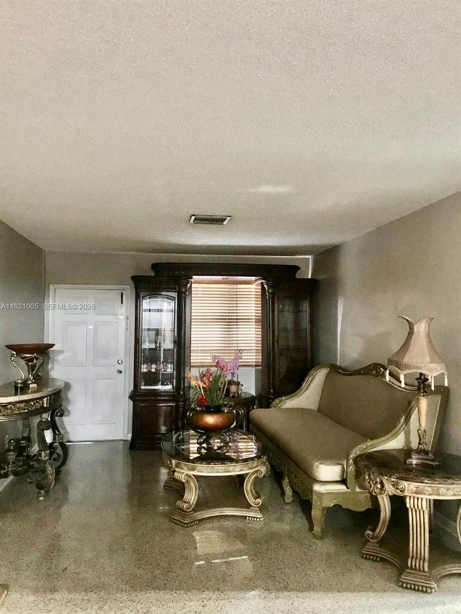 266 East 12th Street Hialeah, FL 33010 - Photo 3 of 19 a view of a room with gym equipment