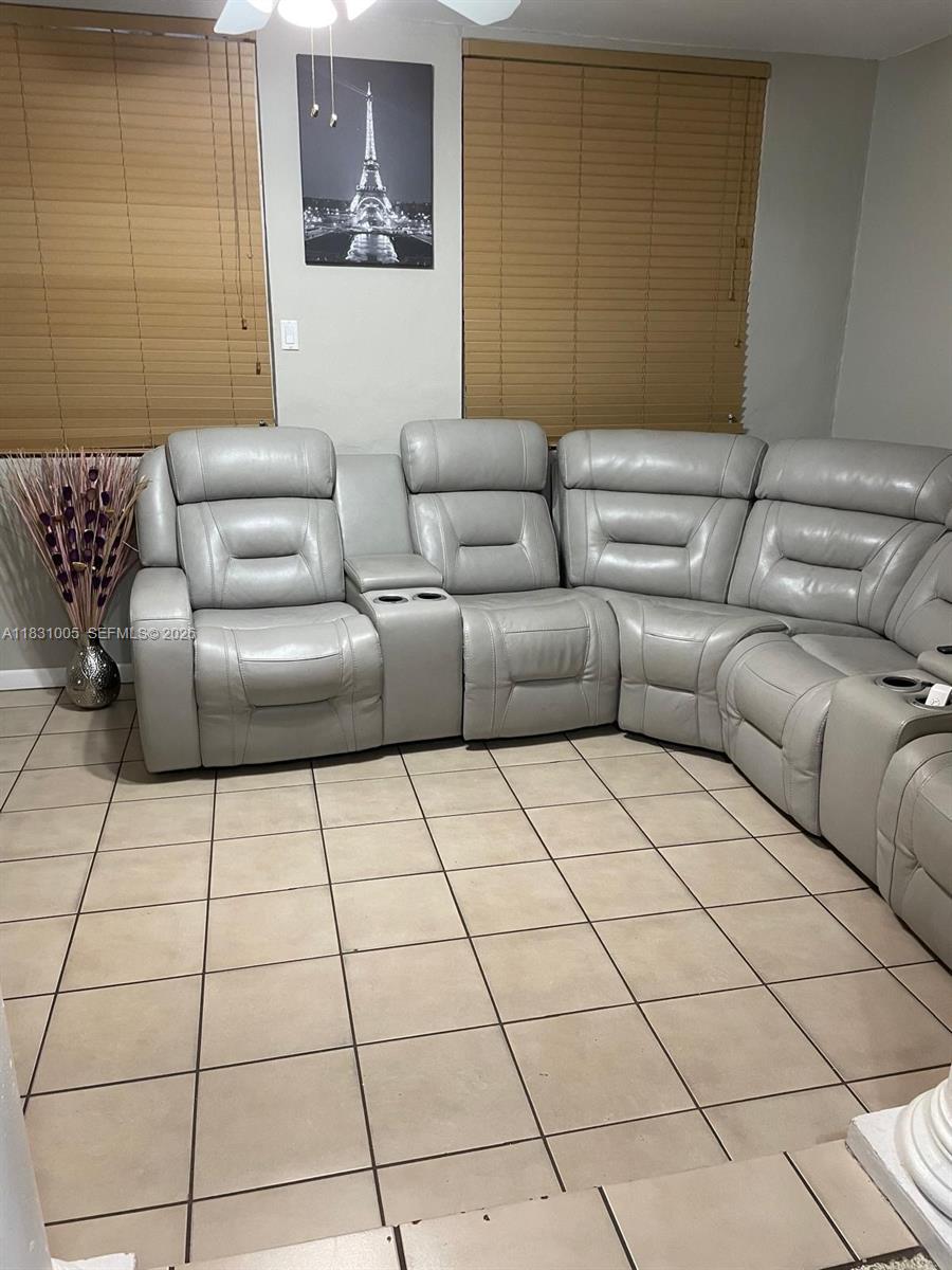 266 East 12th Street Hialeah, FL 33010 - Photo 5 of 19 a living room with a couch