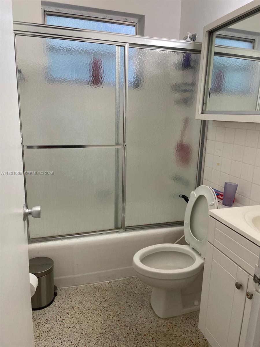 266 East 12th Street Hialeah, FL 33010 - Photo 10 of 19 a bathroom with a toilet and a shower