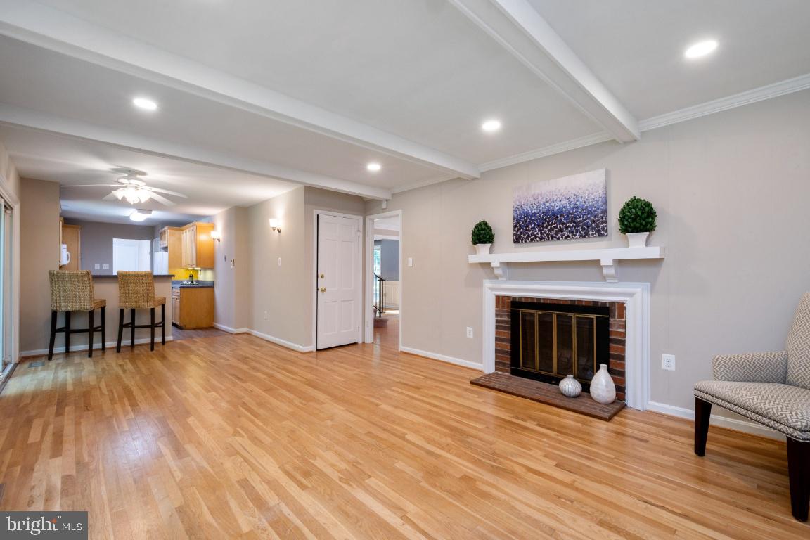 11526 Vale Road Oakton, VA 22124 - Photo 10 of 39 Family Room with Wood Burning Fireplace