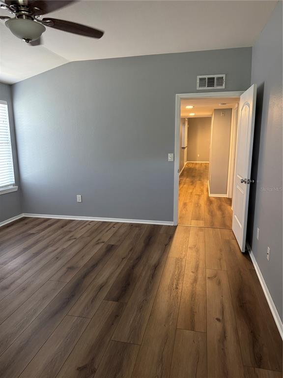 416 Summit Ridge Place, Unit 316 Longwood, FL 32779 - Photo 16 of 24 a view of a room with wooden floor and staircase