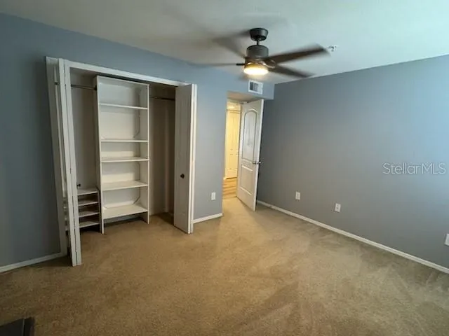 an empty room with a bathroom