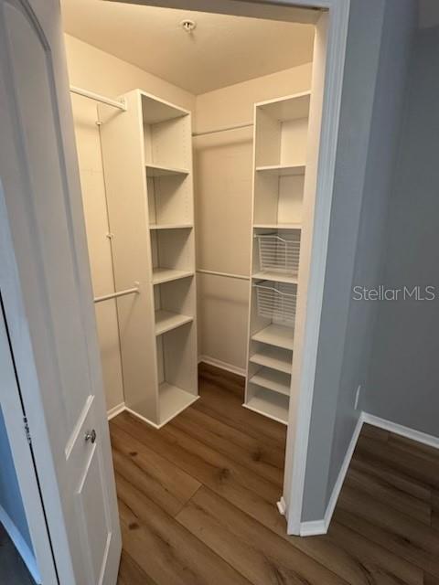 416 Summit Ridge Place, Unit 316 Longwood, FL 32779 - Photo 21 of 24 a view of walk in closet with empty racks