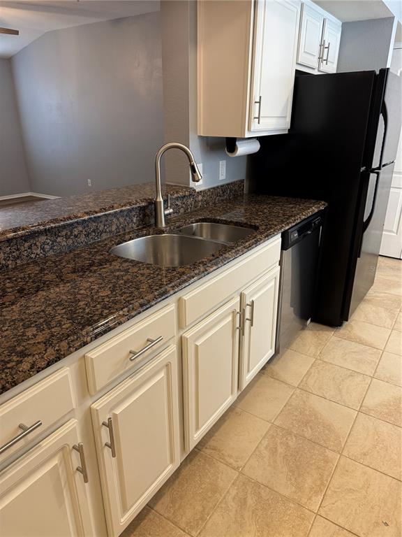 416 Summit Ridge Place, Unit 316 Longwood, FL 32779 - Photo 5 of 24 a kitchen with granite countertop a sink a stove and refrigerator