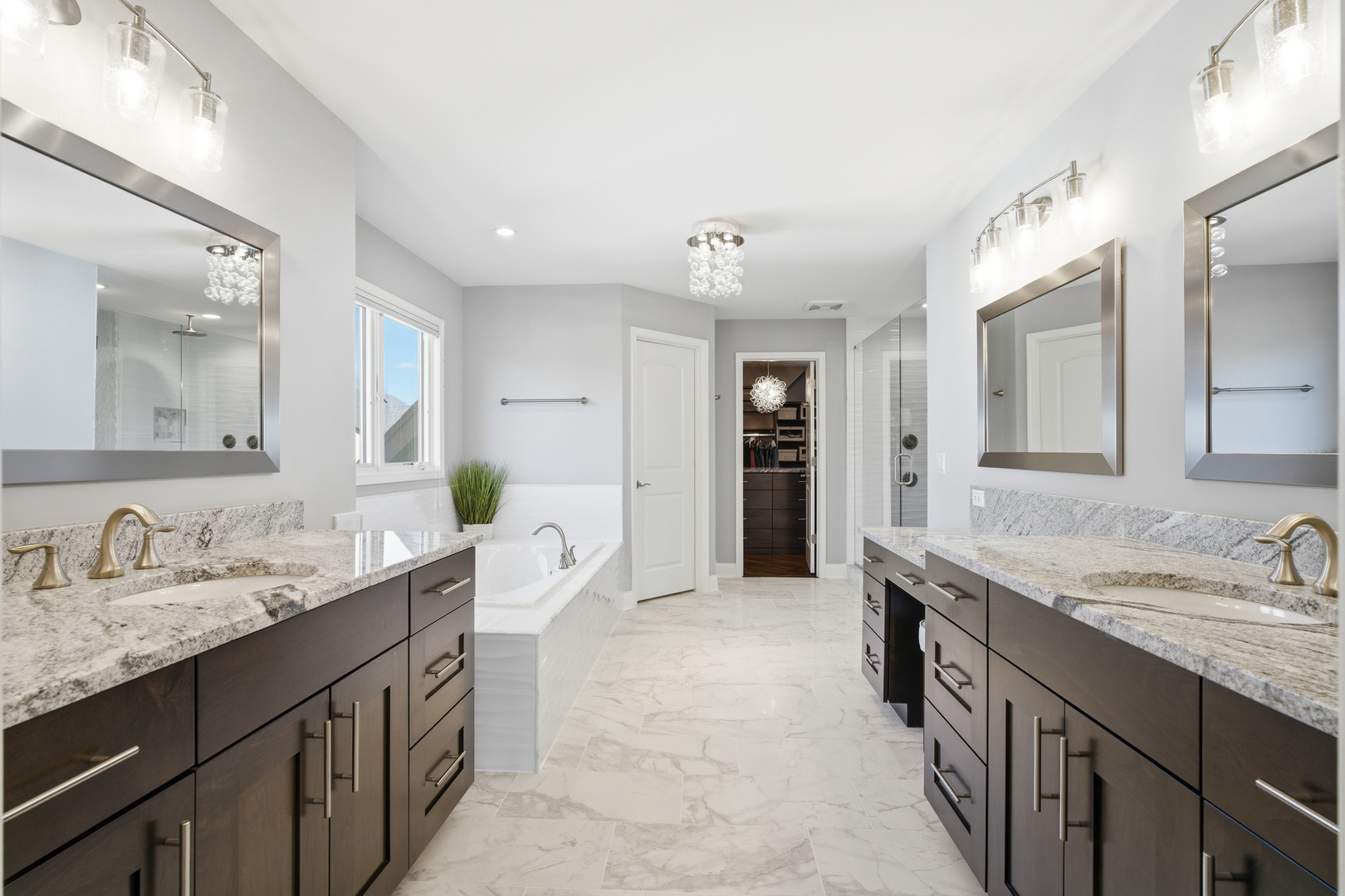 28 Pinnacle Court Naperville, IL 60565 - Photo 17 of 40 a spacious bathroom with a granite countertop double vanity sink and a mirror