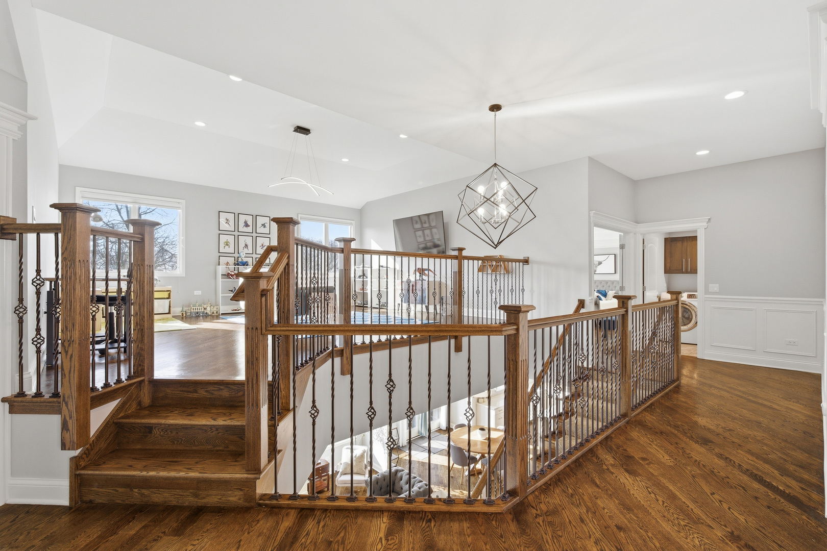 28 Pinnacle Court Naperville, IL 60565 - Photo 26 of 40 a view of entryway dining room and hall with wooden floor