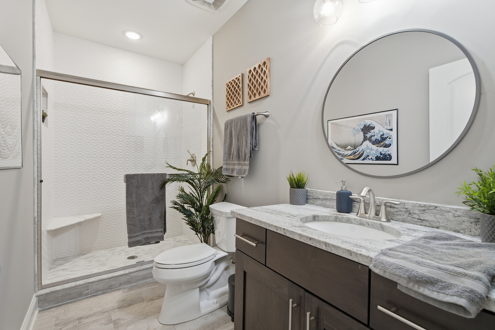 28 Pinnacle Court Naperville, IL 60565 - Photo 31 of 40 a bathroom with a granite countertop sink mirror vanity and toilet