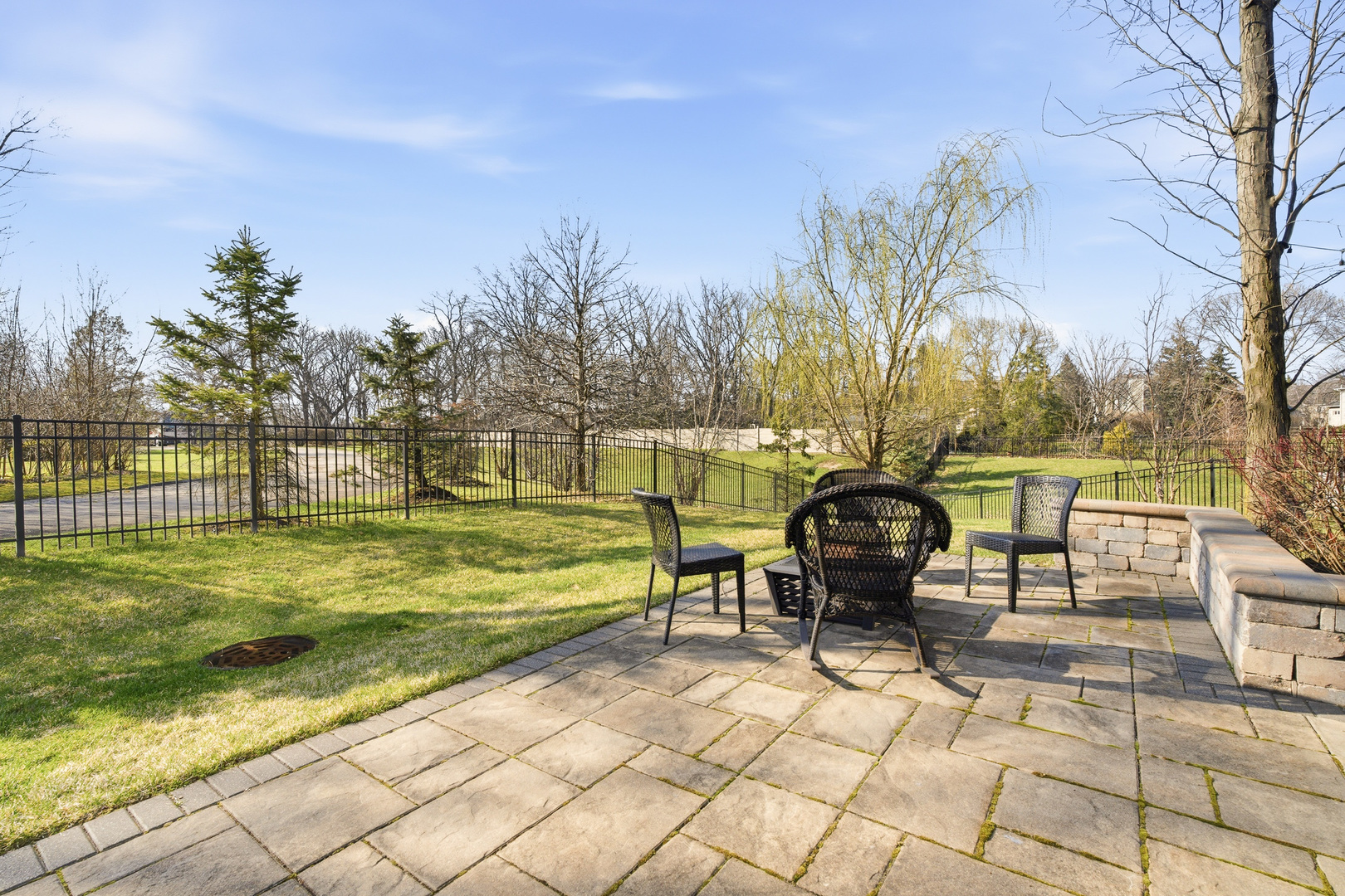 28 Pinnacle Court Naperville, IL 60565 - Photo 35 of 40 a view of a lake with a lounge chair