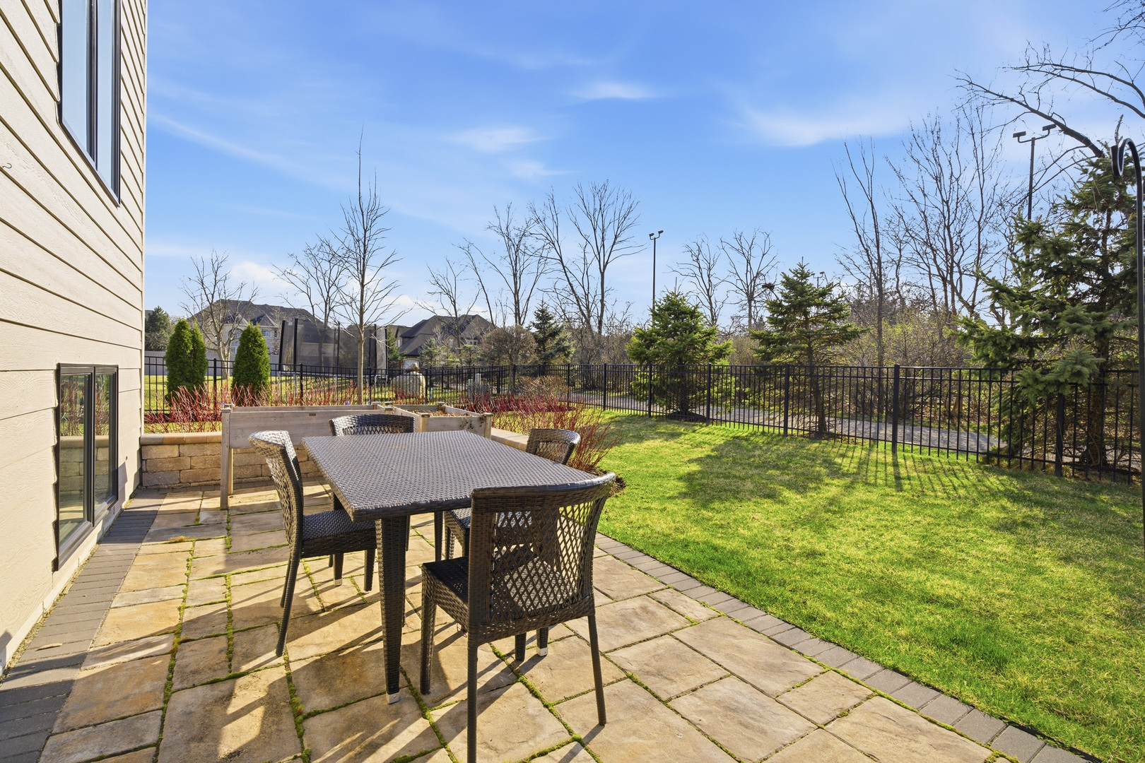 28 Pinnacle Court Naperville, IL 60565 - Photo 36 of 40 a view of a backyard with sitting area
