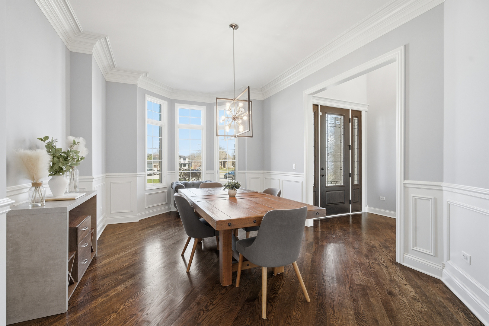 28 Pinnacle Court Naperville, IL 60565 - Photo 10 of 40 a view of a dining room with furniture window and wooden floor
