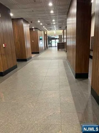 a lobby with entryway and hallway