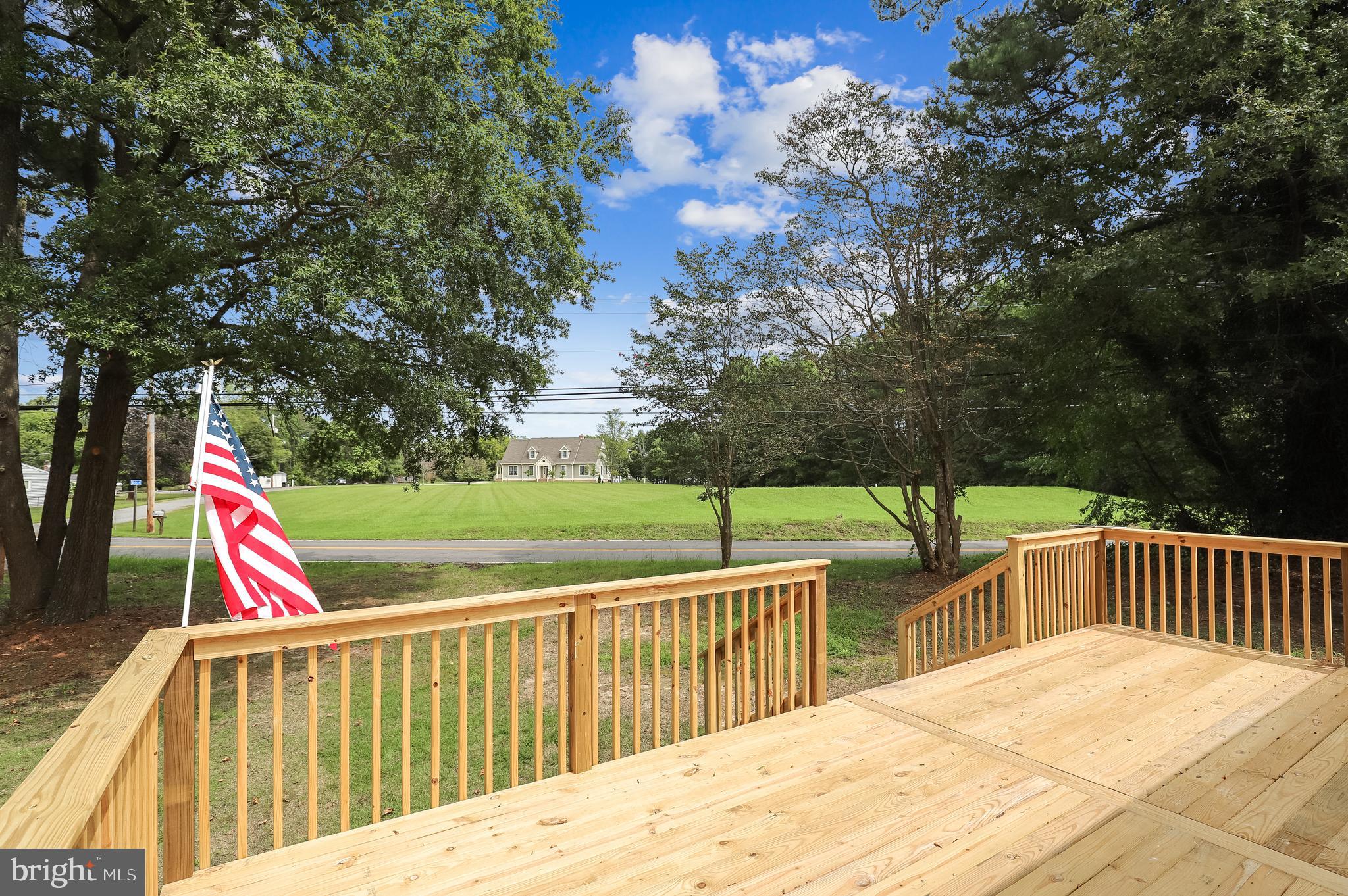 20620 Colton Point Road Coltons Point, MD 20626 - Photo 21 of 34 Large front deck for entertaining or relaxing!