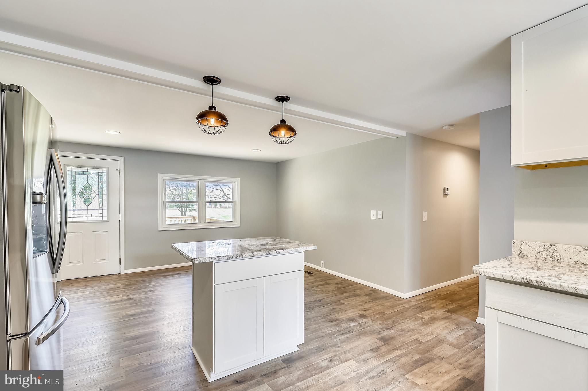 20620 Colton Point Road Coltons Point, MD 20626 - Photo 5 of 34 Beautiful luxury vinyl plank floors throughout.