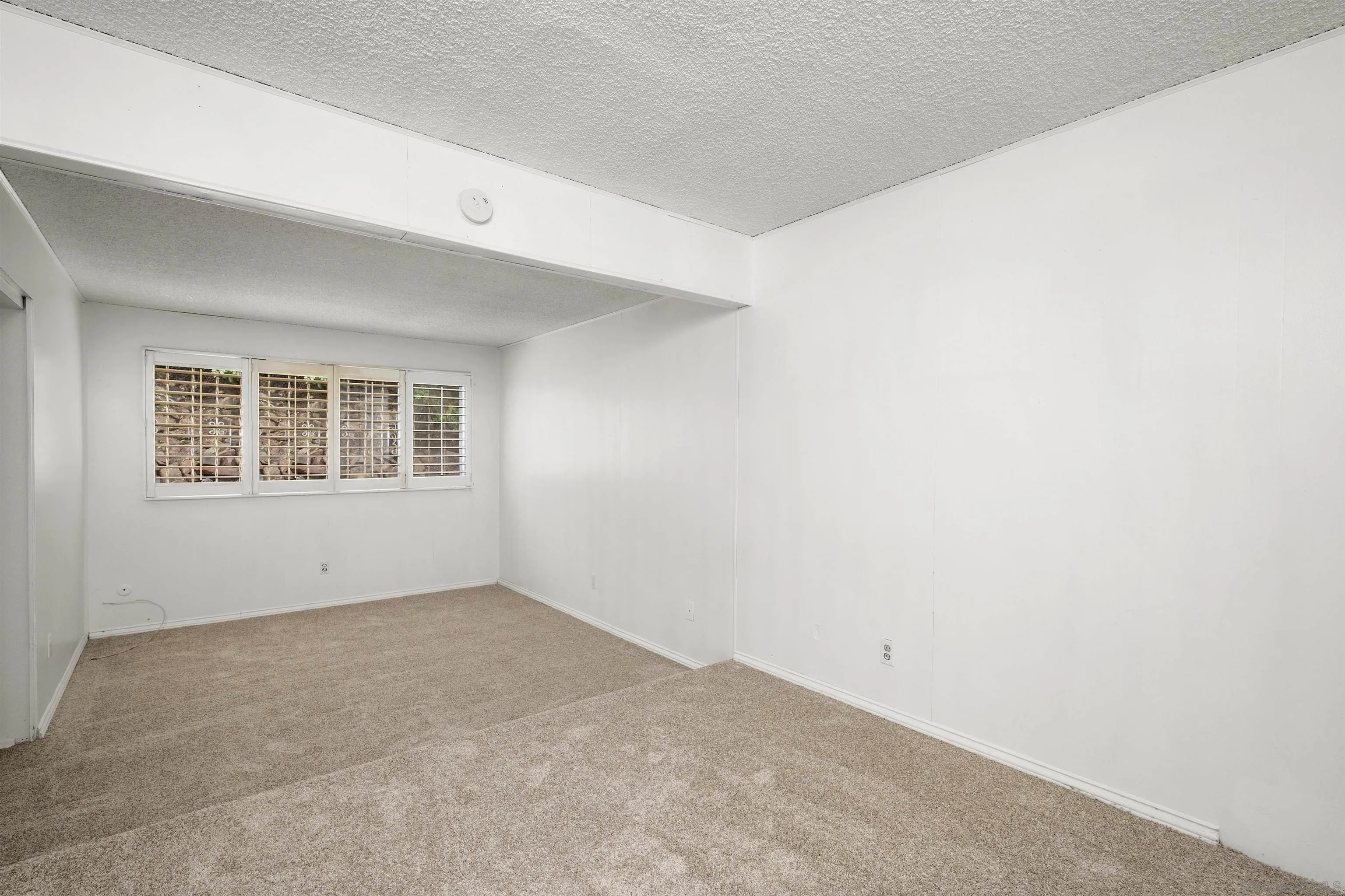 2854 Rhoades Road San Diego, CA 92139 - Photo 6 of 10 an empty room with windows