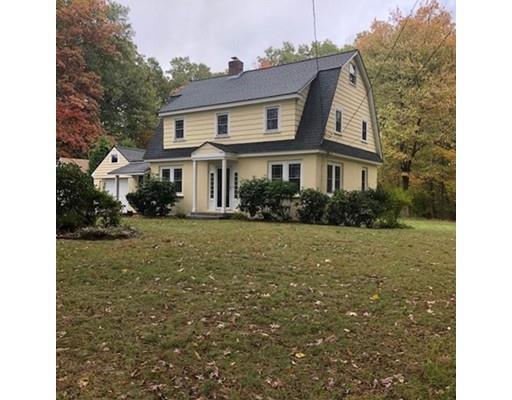 412 South Meadow Road Lancaster, MA 01523 - Photo 1 of 24 a front view of a house with a yard