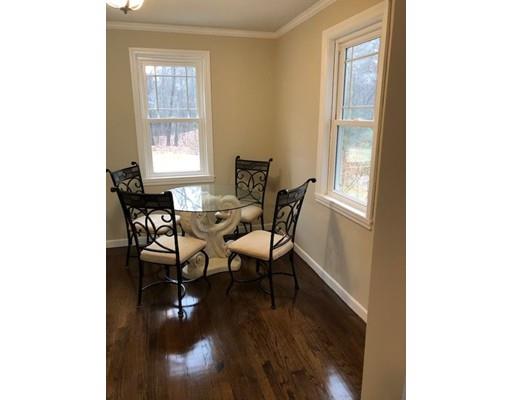 412 South Meadow Road Lancaster, MA 01523 - Photo 13 of 24 a dining room with furniture and wooden floor