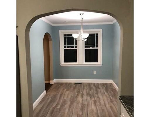 412 South Meadow Road Lancaster, MA 01523 - Photo 14 of 24 a front view of a house with wooden floor