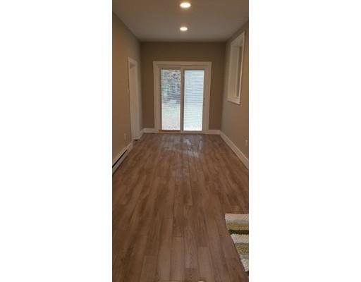 412 South Meadow Road Lancaster, MA 01523 - Photo 16 of 24 a view of an empty room with wooden floor