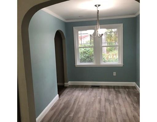 412 South Meadow Road Lancaster, MA 01523 - Photo 7 of 24 a room with window and a wooden floor