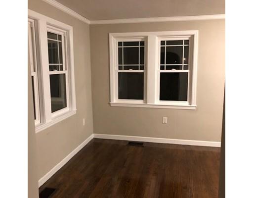412 South Meadow Road Lancaster, MA 01523 - Photo 9 of 24 a view of empty room with windows and entryway
