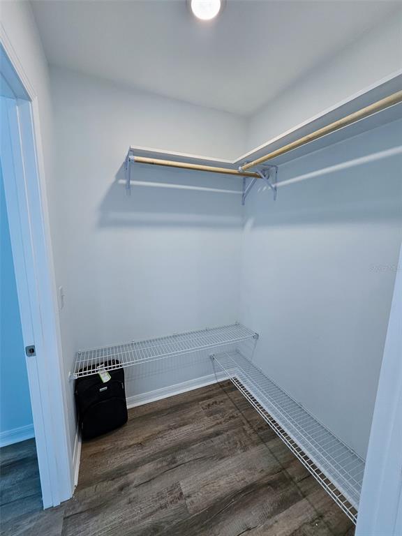 12293 Southwest 89th Street Dunnellon, FL 34432 - Photo 17 of 21 a view of a room with wooden floor