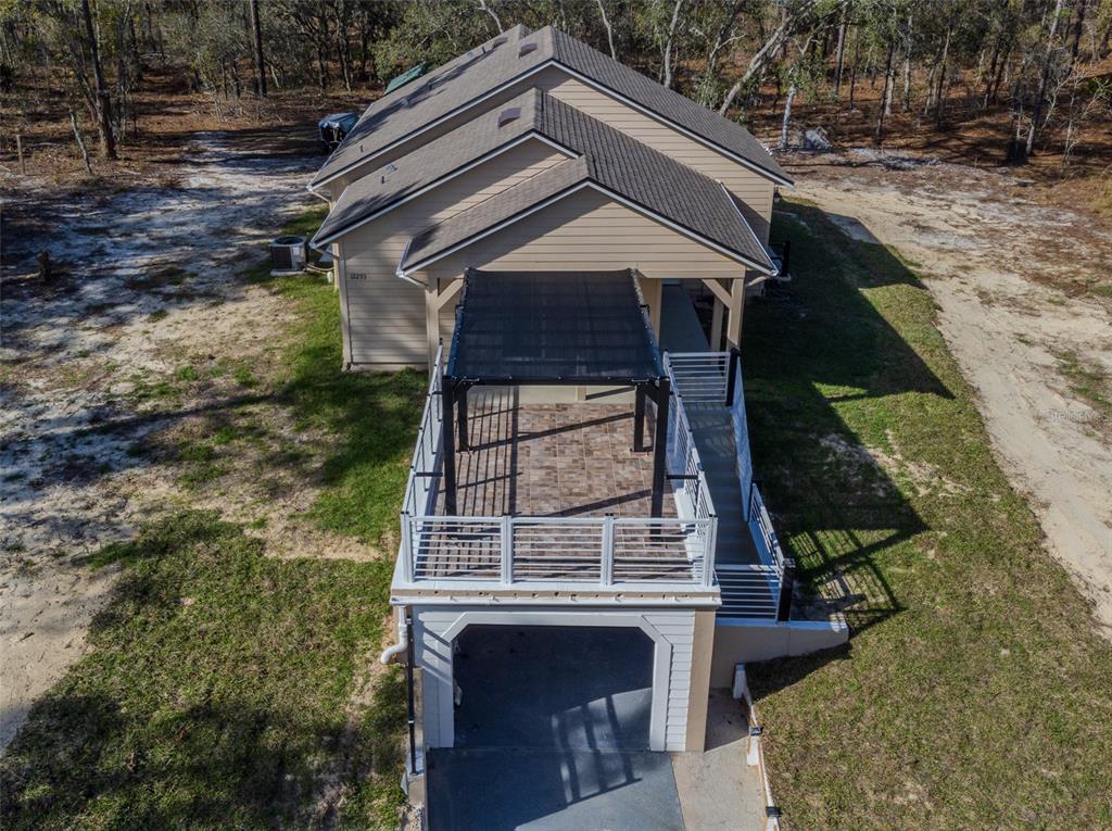 12293 Southwest 89th Street Dunnellon, FL 34432 - Photo 3 of 21 a aerial view of a house