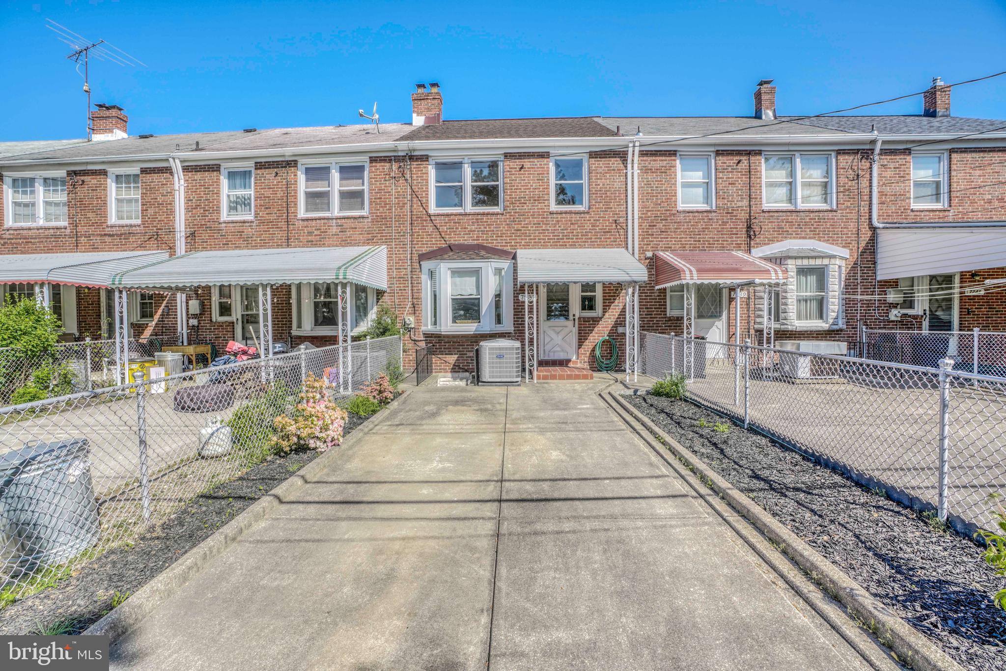 7237 Conley Street Baltimore, MD 21224 - Photo 33 of 34 Back exterior with parking pad