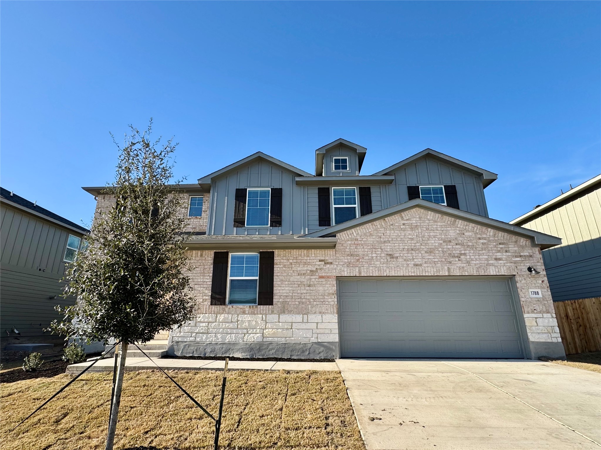 1788 South Main Street Kyle, TX 78640 - Photo 1 of 1 a front view of a house with yard