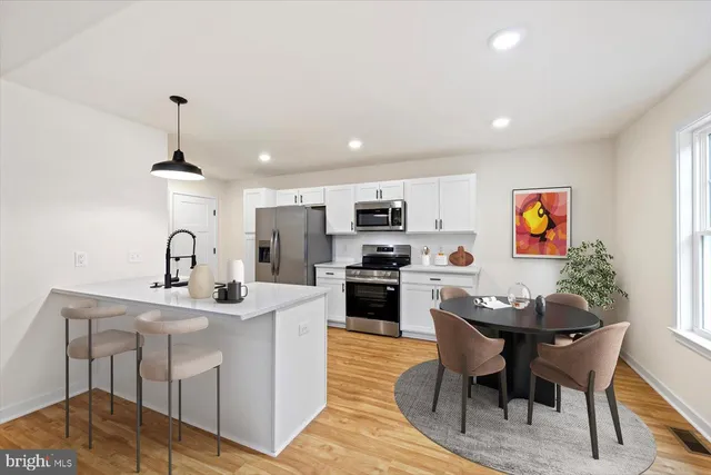a view of a dining room with furniture