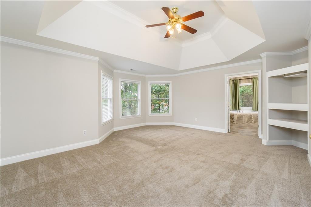 6710 Timber Cove Cumming, GA 30041 - Photo 22 of 42 a view of an empty room with a window