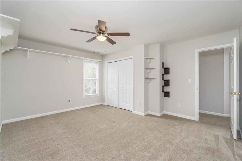 6710 Timber Cove Cumming, GA 30041 - Photo 25 of 42 a view of an empty room with a window