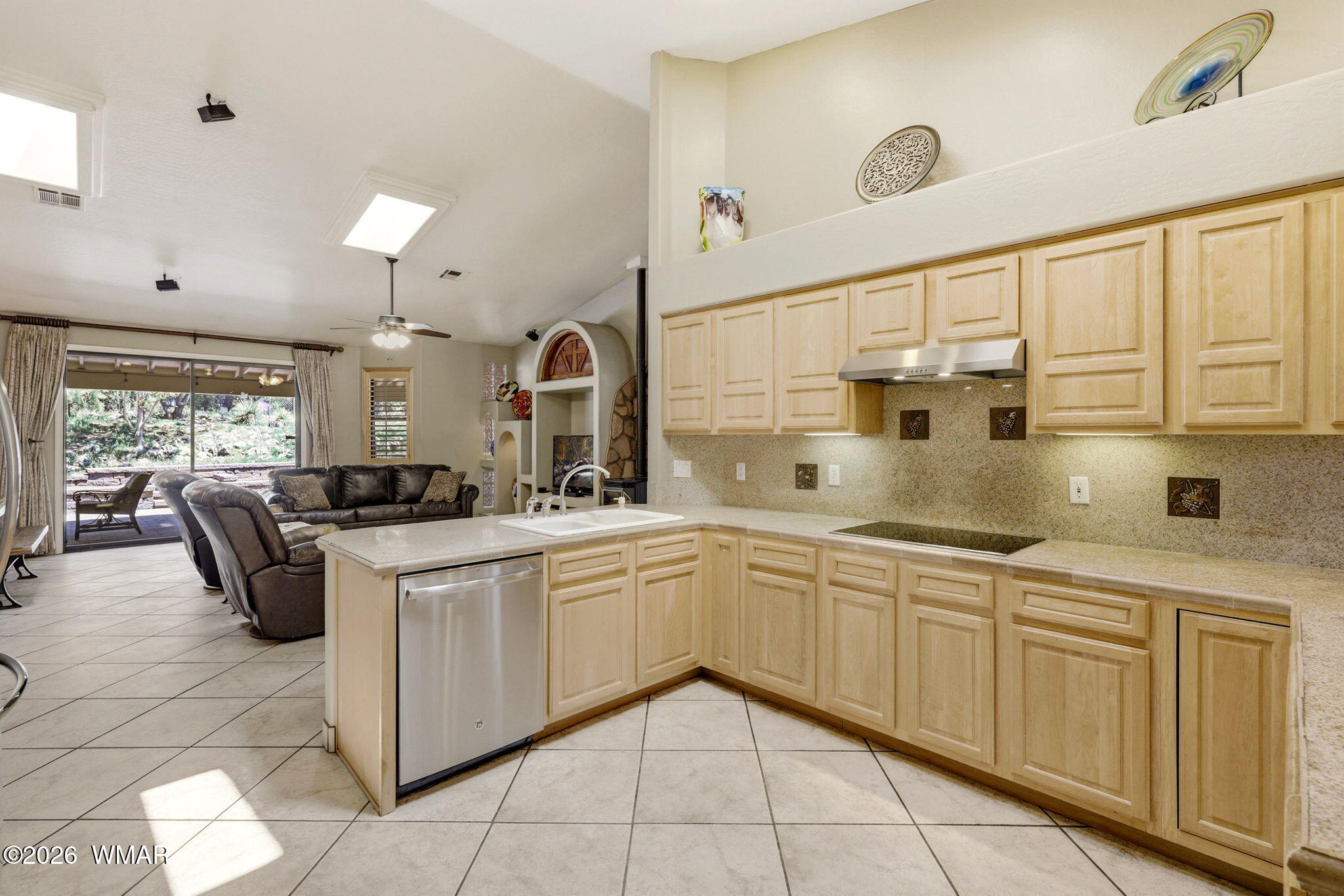 2236 Roundabout Way Overgaard, AZ 85933 - Photo 11 of 45 a kitchen with a sink and cabinets