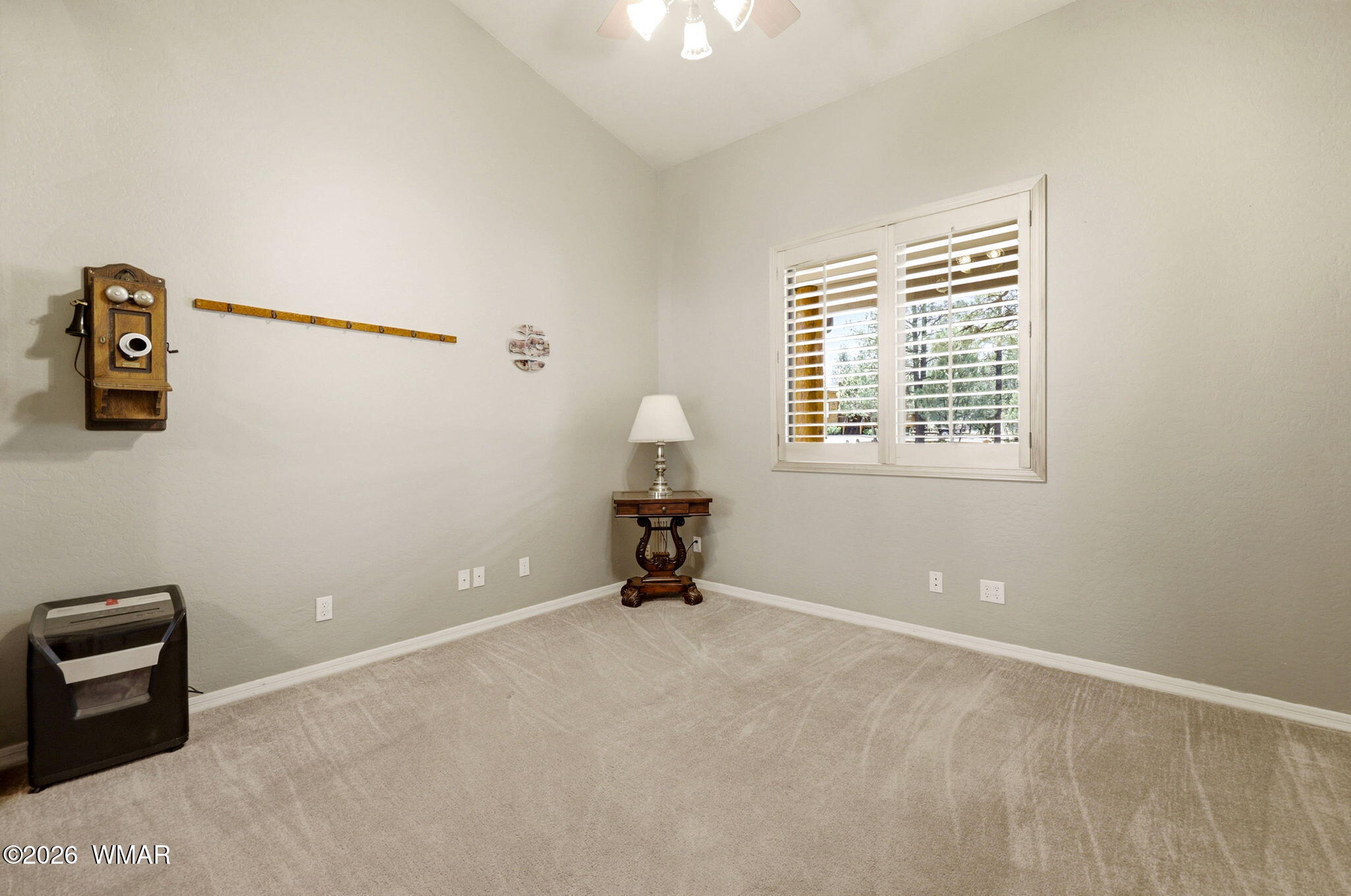 2236 Roundabout Way Overgaard, AZ 85933 - Photo 22 of 45 a room with window and a table