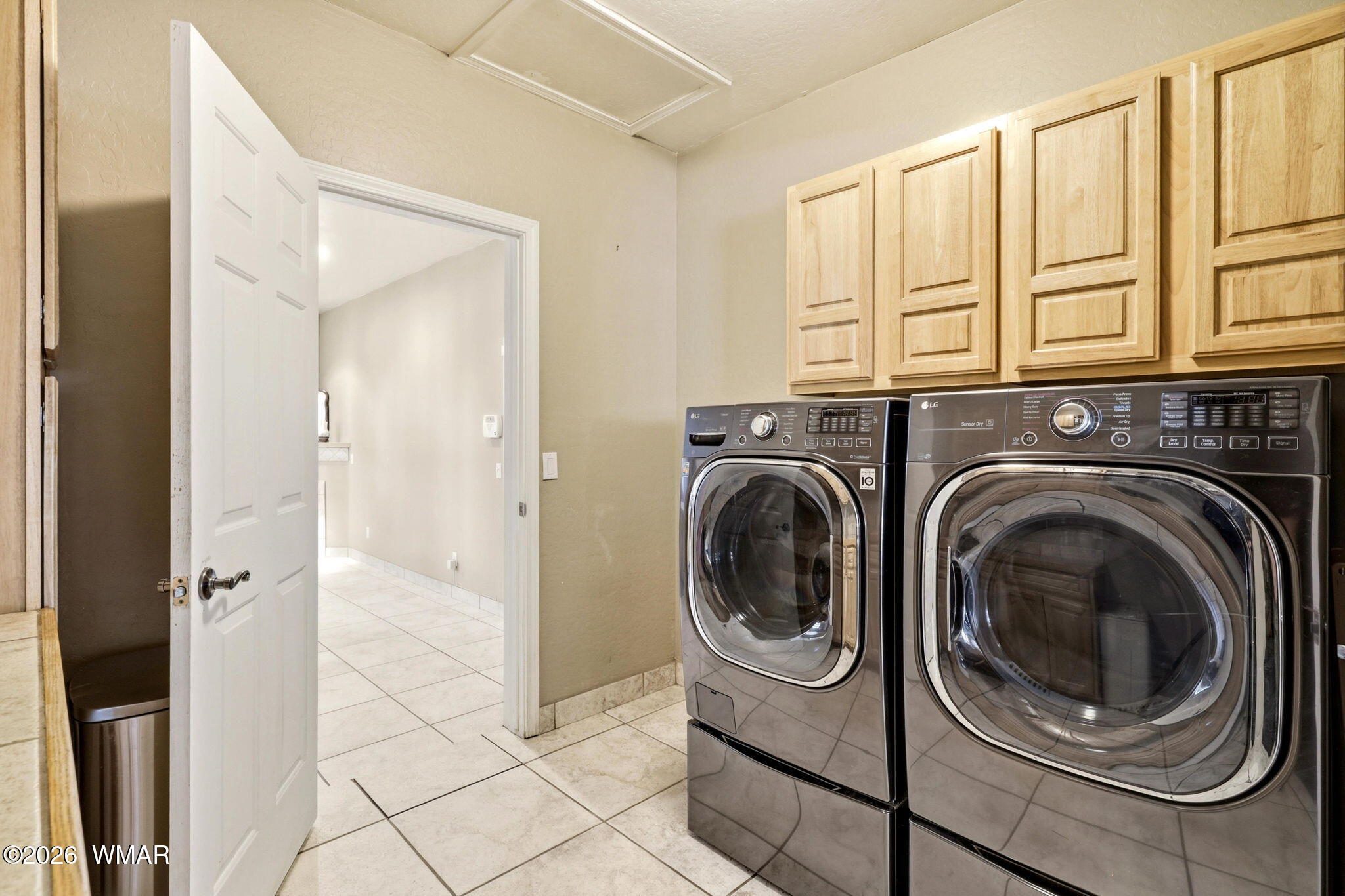 2236 Roundabout Way Overgaard, AZ 85933 - Photo 23 of 45 a view of a hallway with washer and dryer