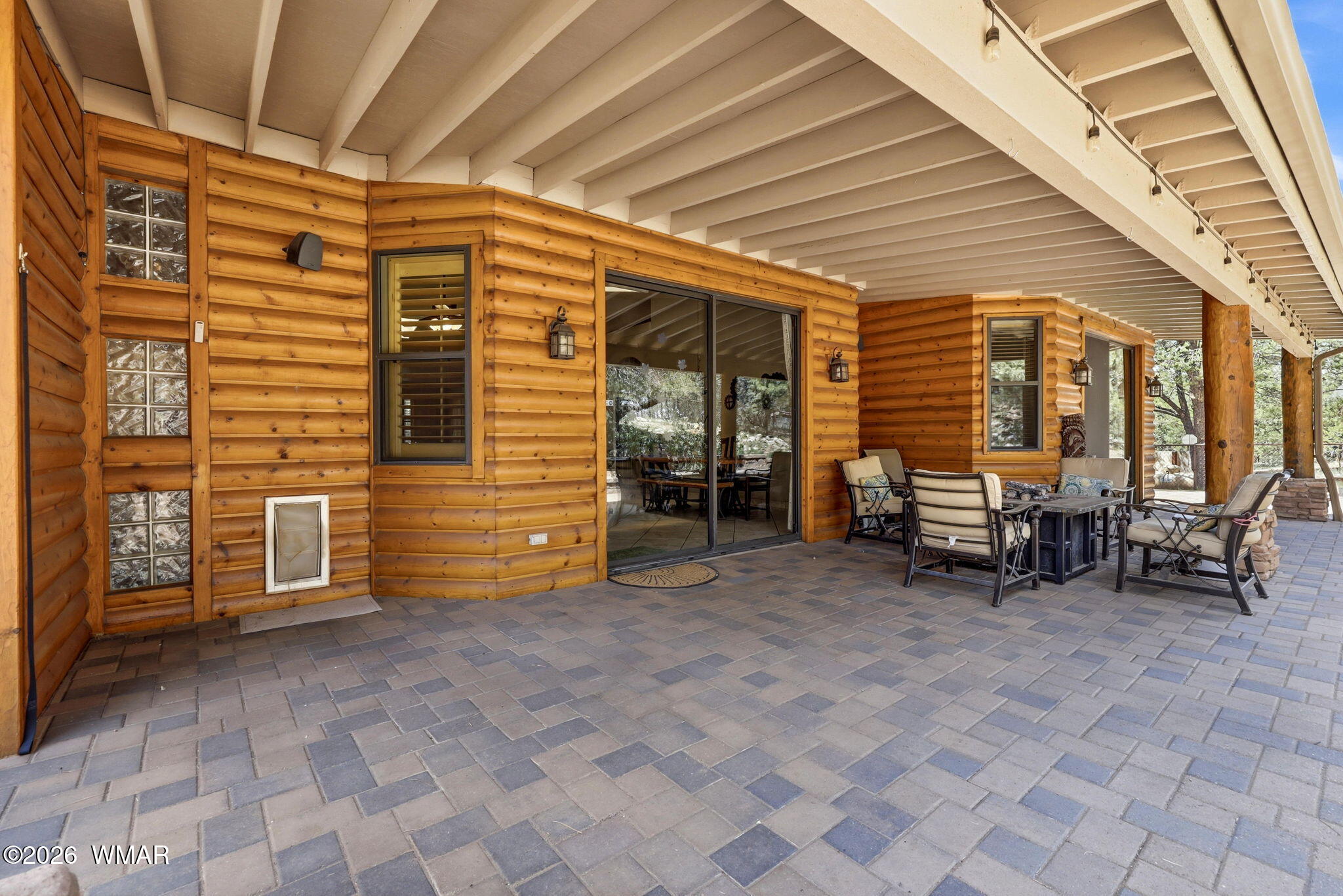 2236 Roundabout Way Overgaard, AZ 85933 - Photo 27 of 45 a view of a patio with table and chairs and a barbeque