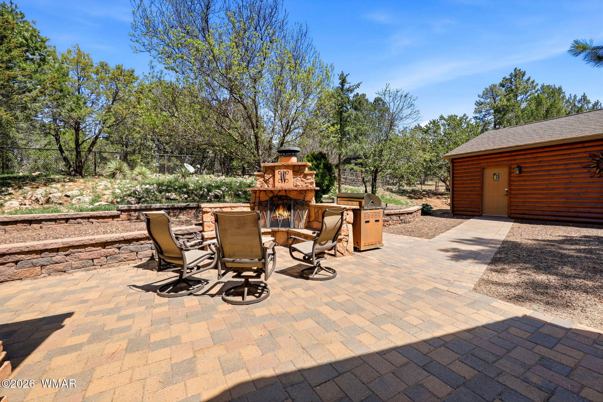 2236 Roundabout Way Overgaard, AZ 85933 - Photo 28 of 45 a view of a backyard with sitting area
