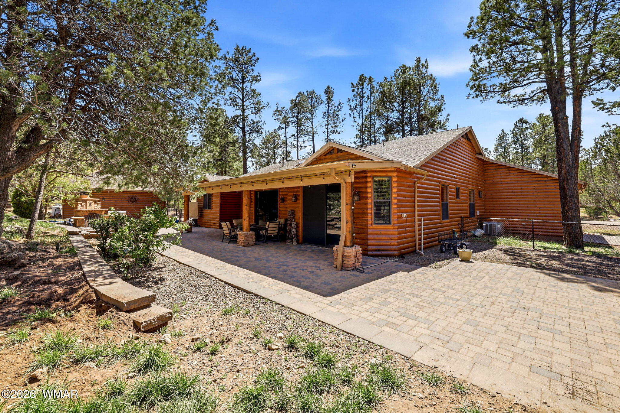 2236 Roundabout Way Overgaard, AZ 85933 - Photo 30 of 45 a view of a house with a yard covered in snow