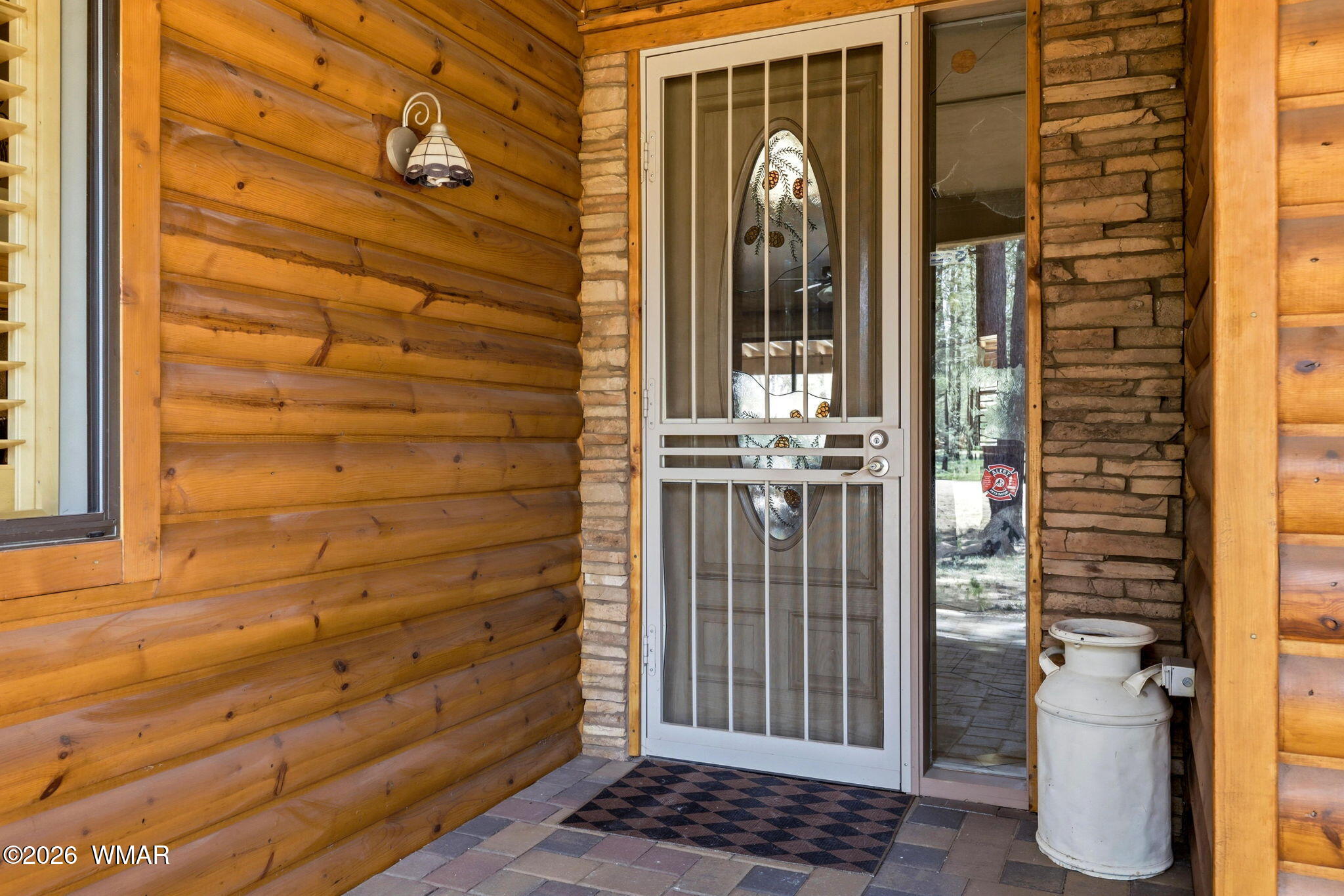 2236 Roundabout Way Overgaard, AZ 85933 - Photo 4 of 45 a view of a door and brick walls