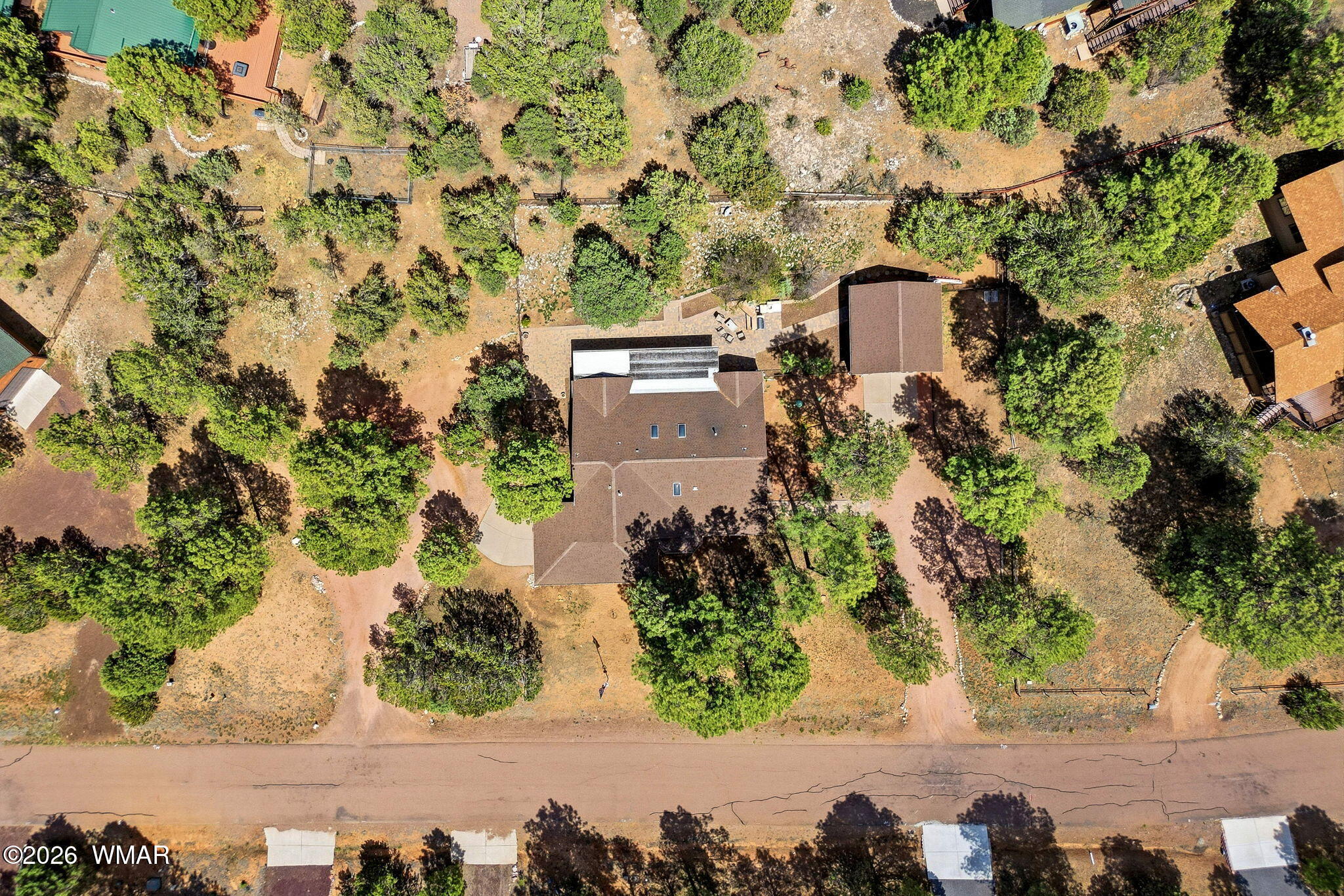 2236 Roundabout Way Overgaard, AZ 85933 - Photo 42 of 45 an aerial view of a house with a yard