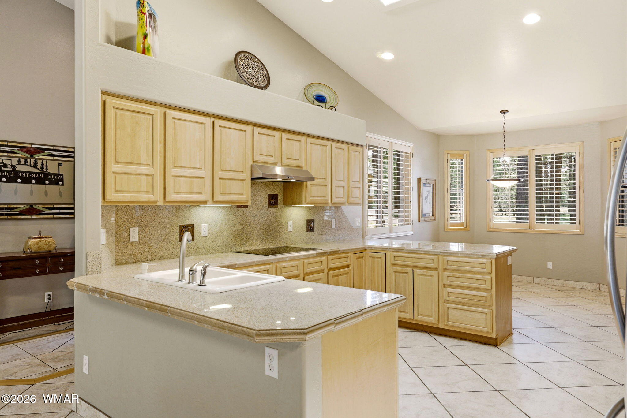 2236 Roundabout Way Overgaard, AZ 85933 - Photo 10 of 45 a kitchen with a sink and cabinets