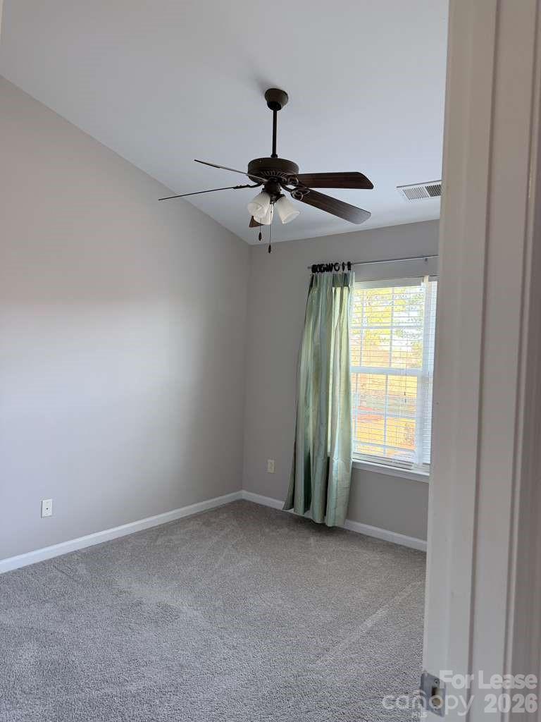 2716 Dunrobin Place Fort Mill, SC 29707 - Photo 15 of 26 a view of an empty room with a window