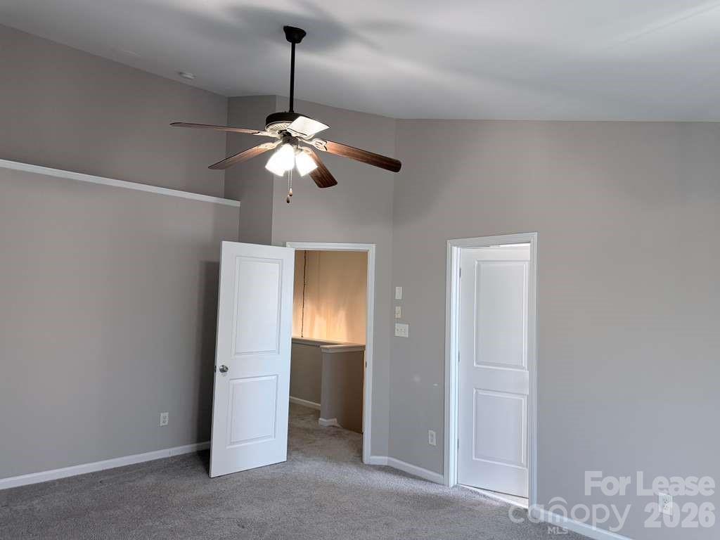 2716 Dunrobin Place Fort Mill, SC 29707 - Photo 17 of 26 a view of a chandelier fan and entryway