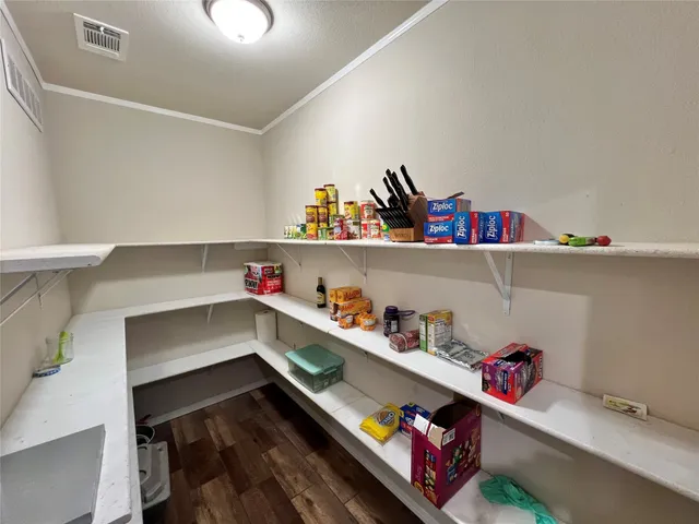 a room with storage and utility