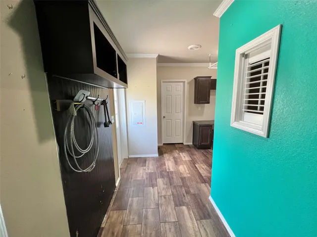 a view of a storage & utility room with a sink