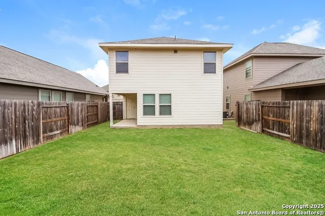 a front view of house with yard
