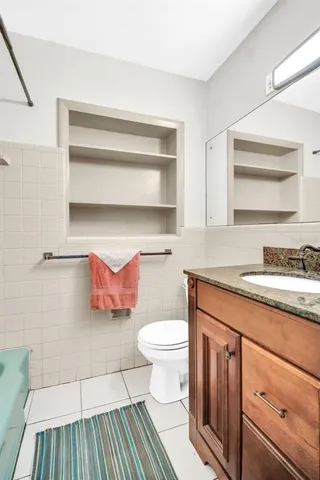 a bathroom with a sink and a toilet