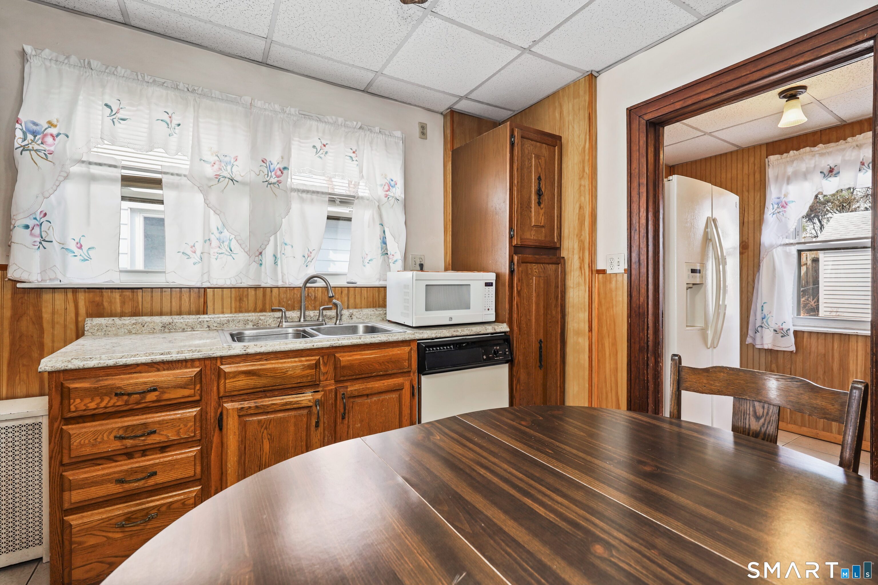 33 West View Street Waterbury, CT 06706 - Photo 12 of 29 a large kitchen with stainless steel appliances granite countertop a stove and a refrigerator