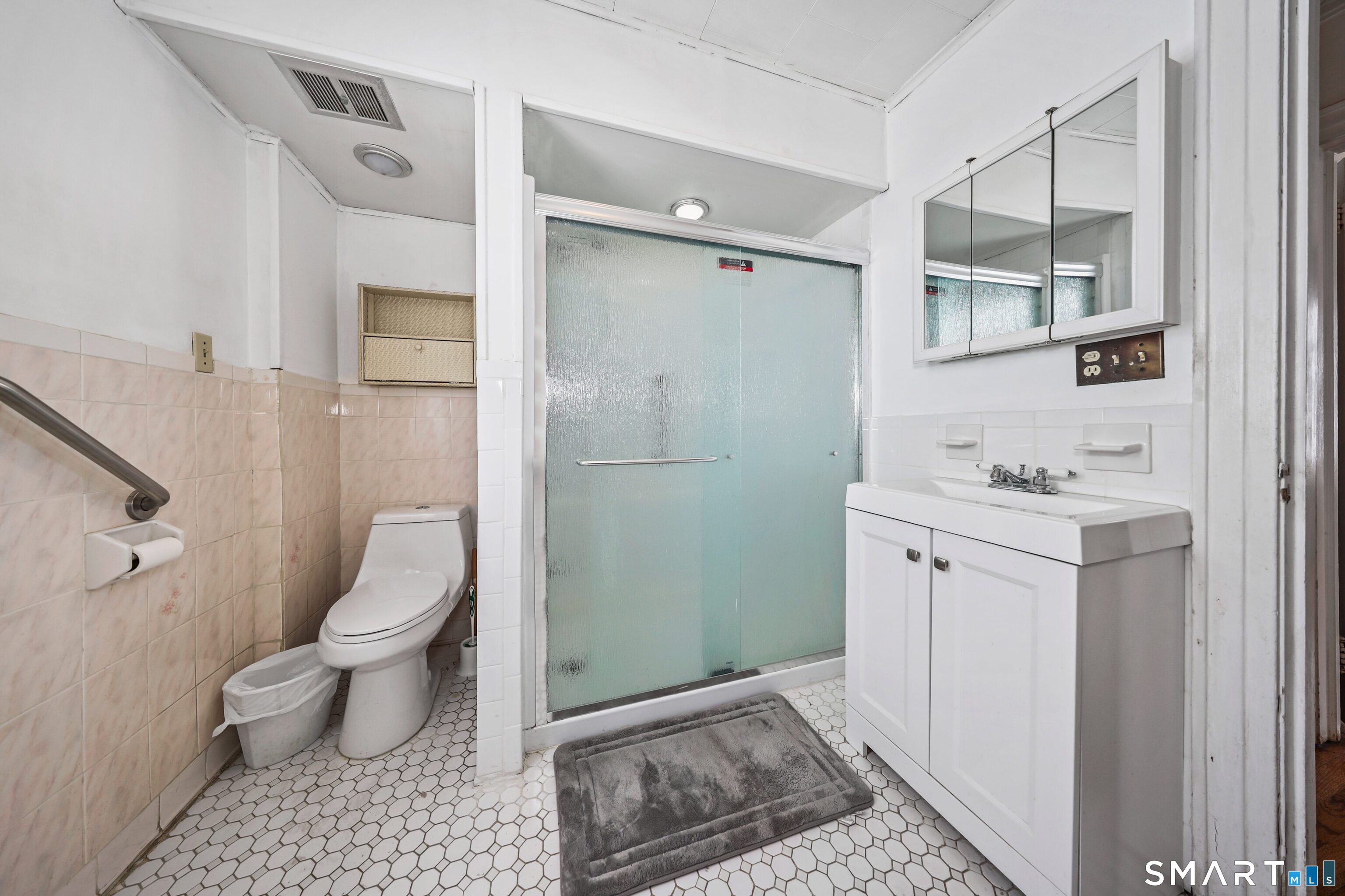 33 West View Street Waterbury, CT 06706 - Photo 19 of 29 a bathroom with a sink a toilet and shower