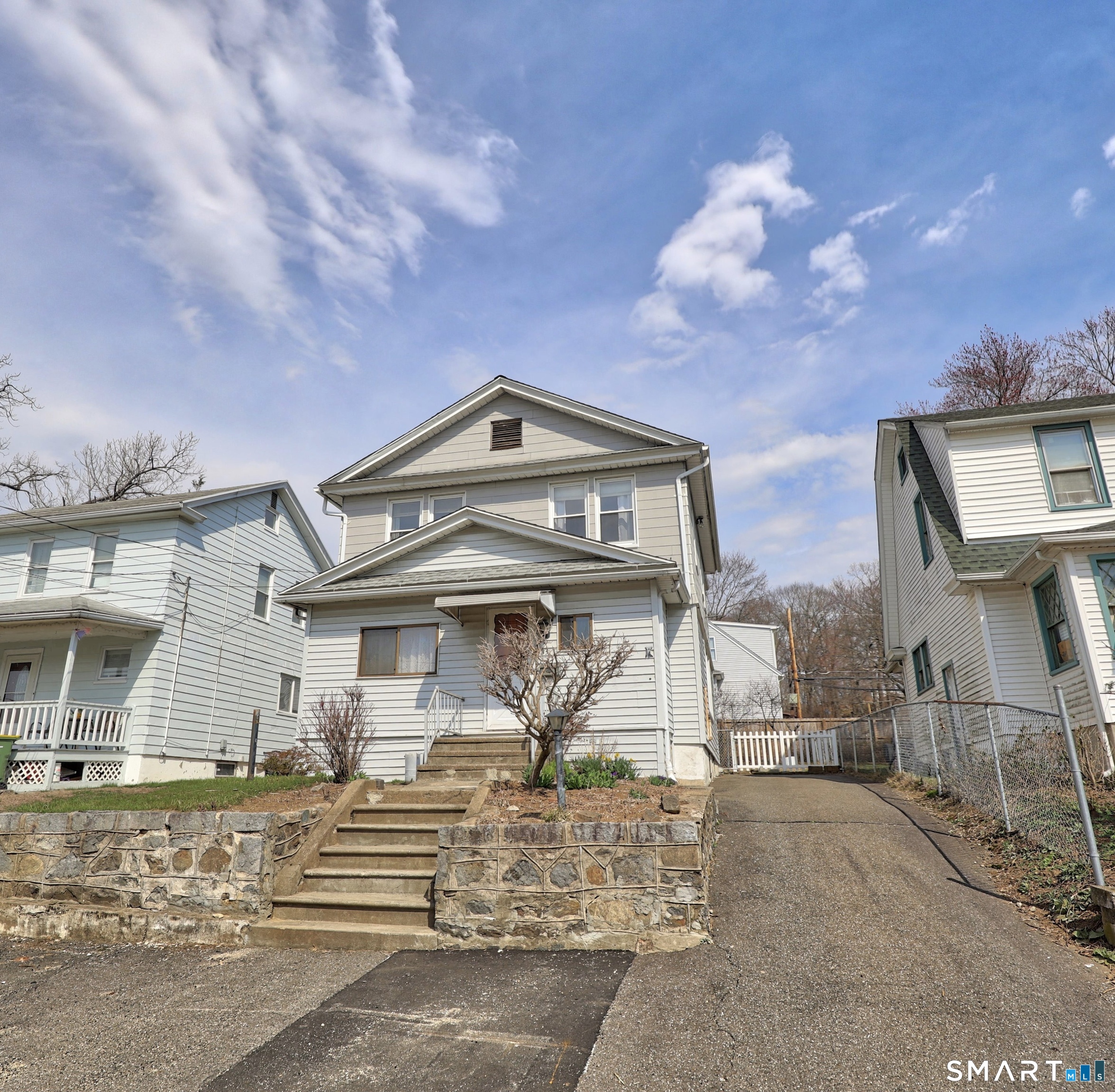 33 West View Street Waterbury, CT 06706 - Photo 2 of 29 a front view of a house with a fountain